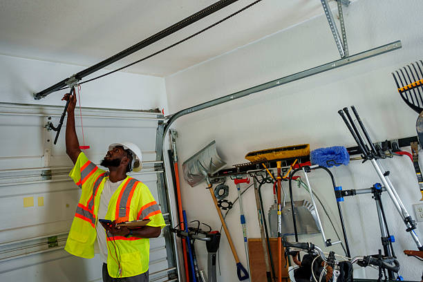 Professional Garage Door Roller Replacement technician working in Ellwood City, PA